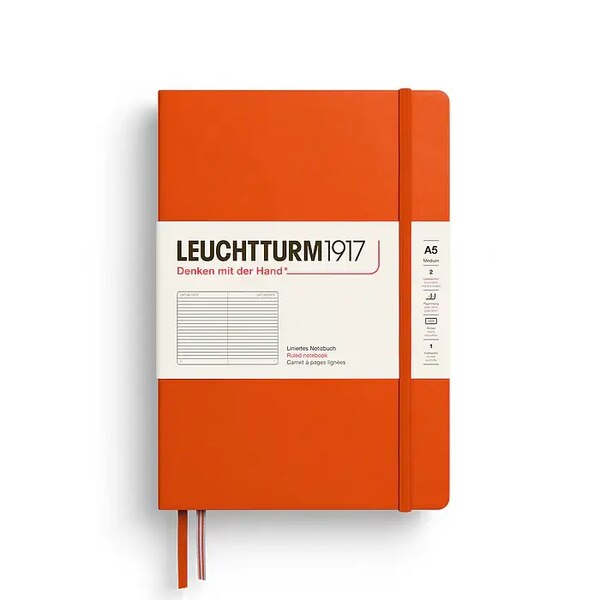 Pumpkin colored ruled notebook